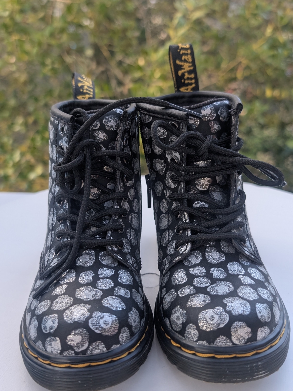 Dr. Martens Black Boots with Silver Leopard Print